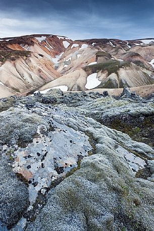 The multicoloured rhyolite mountains in the area of Landmannalaugar at sunset The multicoloured rhyolite mountains in the area of Landmannalaugar at sunset
