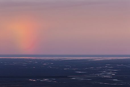 Rainbow over the desertic landscape of South Iceland from the mountain area of Skftafell