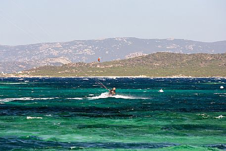 Kitesurf  in the water of Tonnara beach, Corse, France, Europe