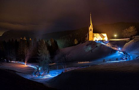 Night procession during the carnival of Sauris, San Lorenzo church, Sauris