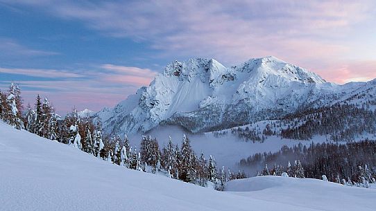 Mount Bivera and the beautiful winter landscape that you meet along the road from Sauris to Casera Razzo.