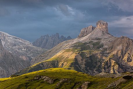 Light and cloudy sky over Tre Scarperi Group, Sexten Dolomites, Italy