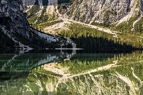 Braies Lake (Pragser Wildsee) with first light morning on Croda del Becco mountain (Seekofel), Dolomites, South Tyrol, Italy 