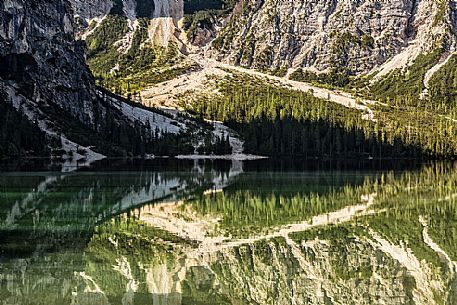 Braies Lake (Pragser Wildsee) with first light morning on Croda del Becco mountain (Seekofel), Dolomites, South Tyrol, Italy 