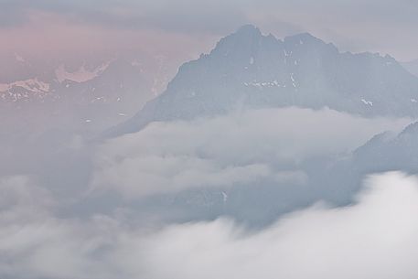 Overcast landscapes of the dolomites from Passo Sella toward Val di Fassa Valley, Trentino, Italy Overcast landscapes of the dolomites from Passo Sella toward Val di Fassa Valley, Trentino, Italy