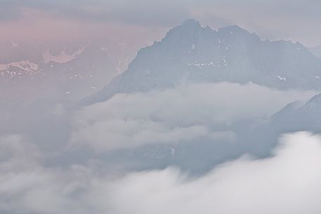 Overcast landscapes of the dolomites from Passo Sella toward Val di Fassa Valley, Trentino, Italy