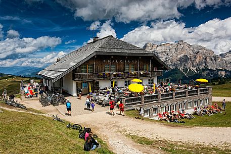 Tourists at Pralongi hut, Badia Valley, South Tyrol, Dolomites, Italy