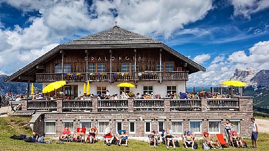 Tourists at Pralongi hut, Badia Valley, South Tyrol, Dolomites, Italy