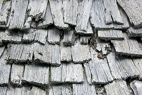 Traditional house, detail of a shingle roof, Badia Valley, dolomites, Italy Traditional house, detail of a shingle roof, Badia Valley, dolomites, Italy