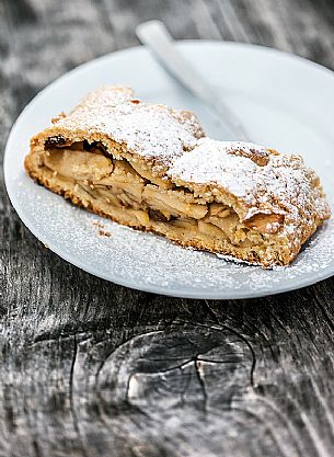 Strudel, typical sweet cake of Dolomites, South Tyrol, Dolomites, Italy