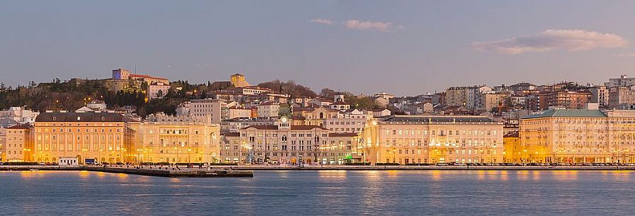 Piazza Unitą d'Italia and Molo Audace, view from the sea of Trieste, Italy Piazza Unitą d'Italia and Molo Audace, view from the sea of Trieste, Italy