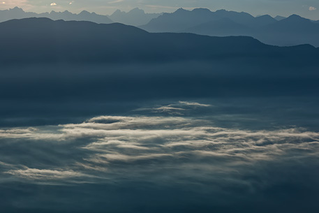 Sunrise on the Non Valley (Val di Non) in the clouds, Brenta dolomites, Italy Sunrise on the Non Valley (Val di Non) in the clouds, Brenta dolomites, Italy