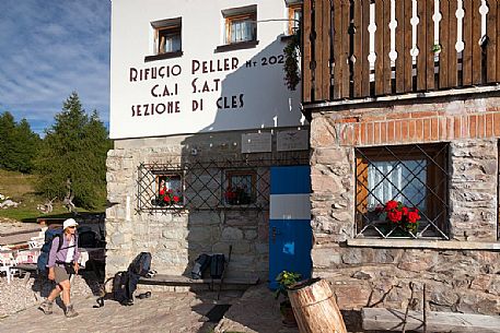 Hiker at Peller mountain hut, Brenta's dolomites, Trentino, Italy