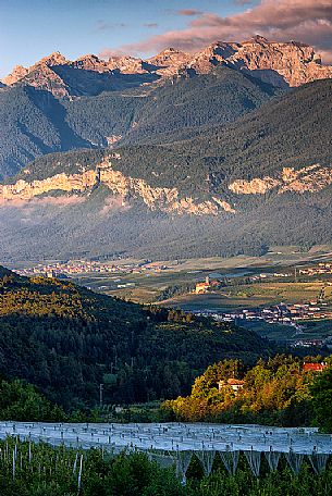 Val di Non and in the background the dolomites of Brenta, Trentino, Italy Val di Non and in the background the dolomites of Brenta, Trentino, Italy