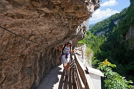 Walking towards the San Romedio Sanctuary, Val di Non, Trentino, Italy Walking towards the San Romedio Sanctuary, Val di Non, Trentino, Italy