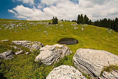 Little lake at Meletta di Gallio, Asiago, Italy