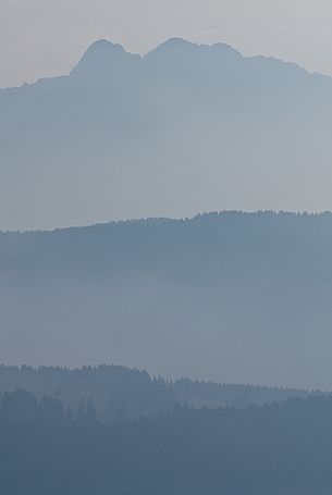 The Verena mount in the morning mist, Asiago plateau, Italy The Verena mount in the morning mist, Asiago plateau, Italy
