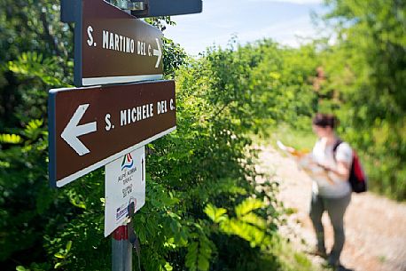 hiker along the path of Romea Strata,
Monte San Michele, San Martino del Carso, Italy