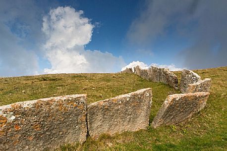 Ancient and typical dry stone wall in Lessinia, Prealps of Veneto, Verona, Italy