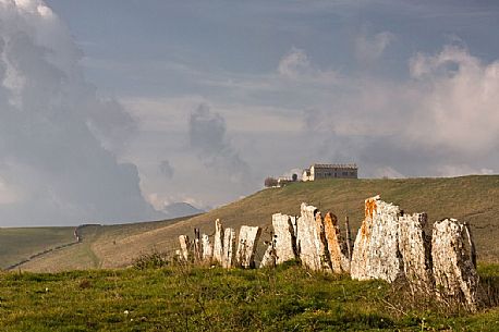 Ancient and typical dry stone wall in Lessinia, Prealps of Veneto, Verona, Italy