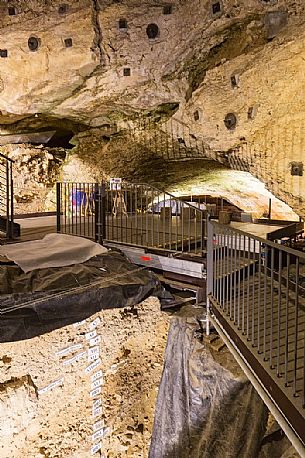 The cave of Fumane, one of the largest prehistoric archaeological sites in Europe, Lessinia mountain, Italy The cave of Fumane, one of the largest prehistoric archaeological sites in Europe, Lessinia mountain, Italy