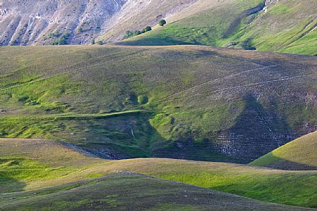 Rolling landscape of Monte Vettore in spring, Castelluccio di Norcia, Italy