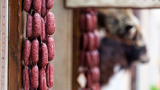 Sausages and salami, typical products on display outside a shop in Norcia, Italy Sausages and salami, typical products on display outside a shop in Norcia, Italy