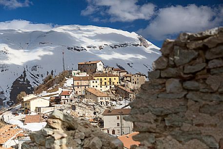 Castelluccio di Norcia, the old village destroyed by the earthquake of 2016, in the background the Vettore montain and its fault, Sibillini national park, Italy Castelluccio di Norcia, the old village destroyed by the earthquake of 2016, in the background the Vettore montain and its fault, Sibillini national park, Italy