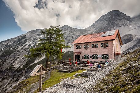 Hikers at Borletti hut in the Stelvio national park, Trafoi, South Tyrol, Italy