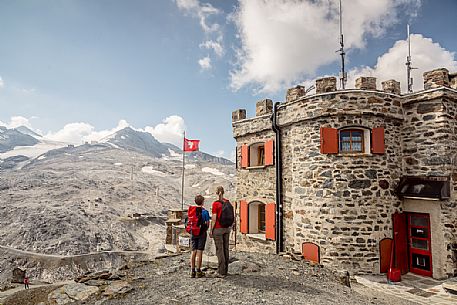 Hikers at Garibaldi hut or Dreisprachenspitze, Stelvio pass, Stelvio national park, Italy Hikers at Garibaldi hut or Dreisprachenspitze, Stelvio pass, Stelvio national park, Italy