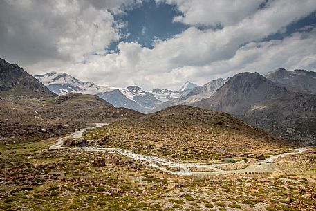 Along the glacier path of the Martello valley, in the background the Cevedale glacier and Gran Zebr peak, Stelvio national park, Italy