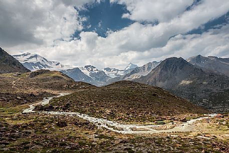 Along the glacier path of the Martello valley, in the background the Cevedale glacier and Gran Zebr peak, Stelvio national park, Italy