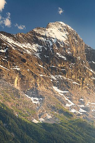 Sunset on Jungfrau mountain group and Eiger mount from Grindelwald village, Berner Oberland, Switzerland, Europe