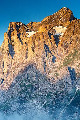 Sunset on Jungfrau mountain group from Grindelwald village, Berner Oberland, Switzerland, Europe