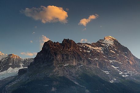 Sunset on Eiger and Fiescherhorn mountain in the Jungfrau mountain group from Grindelwald village, Berner Oberland, Switzerland, Europe