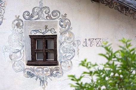 Detail of window and sgraffiti in Ardez village, Low Engadin, Canton of Grisons, Switzerland, Europe