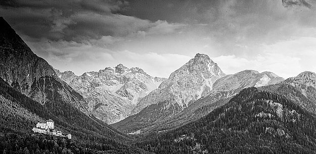 Tarasp Castle and the mountains of Swiss national park, Lower Engadin, Canton of Grisons, Switzerland, Europe