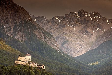 Tarasp Castle and the mountains of Swiss national park, Lower Engadin, Canton of Grisons, Switzerland, Europe Tarasp Castle and the mountains of Swiss national park, Lower Engadin, Canton of Grisons, Switzerland, Europe