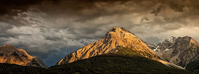 The mountains of national park swiss at sunset next to Scuol, low engadin, canton of Grisons, Switzerland, Europe