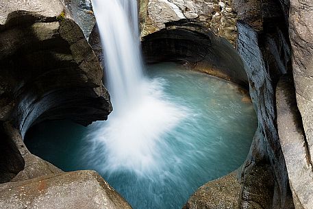 View from above of waterfall in the Cavaglia Glacial Garden also referred to as Giants Pots, Cavaglia, Poschiavo valley, Engadin, Canton of Grisons, Switzerland, Europe