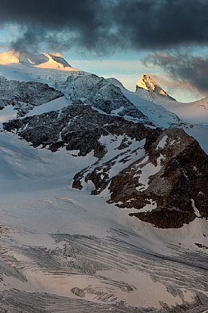 Sunrise on the top Cresta Guzza peak at  Bernina mountain range, Diavolezza hut, Pontresina, Engadin, Canton of Grisons, Switzerland, Europe