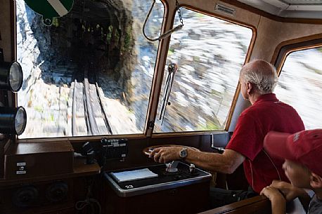 Inside the red Cogwheel Railway going up Pilatus Mountain, Border Area between the Cantons of Lucerne, Nidwalden and Obwalden, Switzerland, Europe