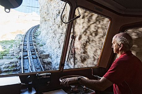 Inside the red Cogwheel Railway going up Pilatus Mountain, Border Area between the Cantons of Lucerne, Nidwalden and Obwalden, Switzerland, Europe