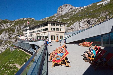 Tourists on the terrace of Pilatus Klum hotel on Pilatus mountain top, Lucerne, Border Area between the Cantons of Lucerne, Nidwalden and Obwalden, Switzerland, Europe