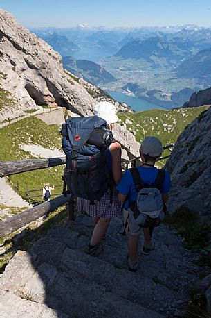 Hiking on the Pilatus mountainn area, in the background the Lucerne lake, Border Area between the Cantons of Lucerne, Nidwalden and Obwalden, Switzerland, Europe Hiking on the Pilatus mountainn area, in the background the Lucerne lake, Border Area between the Cantons of Lucerne, Nidwalden and Obwalden, Switzerland, Europe