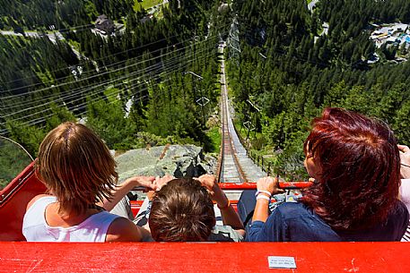 Tourists come down with the Gelmerbahn funicular, the steepest in the world, Canton of Bern, Switzerland, Europe
