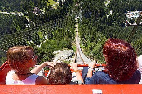 Tourists come down with the Gelmerbahn funicular, the steepest in the world, Canton of Bern, Switzerland, Europe
