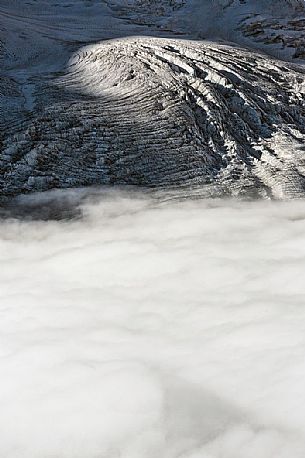 Detail of Gorner glacier in the fog from Gornergrat top, Monte Rosa or Breithorn mountain range, Zermatt, Valais, Switzerland, Europe
Detail of Gorner glacier in the fog from Gornergrat top, Monte Rosa or Breithorn mountain range, Zermatt, Valais, Switzerland, Europe