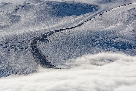 Detail of Gorner glacier in the fog from Gornergrat top, Monte Rosa or Breithorn mountain range, Zermatt, Valais, Switzerland, Europe
 