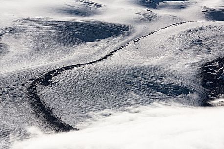 Detail of Gorner glacier in the fog from Gornergrat top, Monte Rosa or Breithorn mountain range, Zermatt, Valais, Switzerland, Europe
Detail of Gorner glacier in the fog from Gornergrat top, Monte Rosa or Breithorn mountain range, Zermatt, Valais, Switzerland, Europe